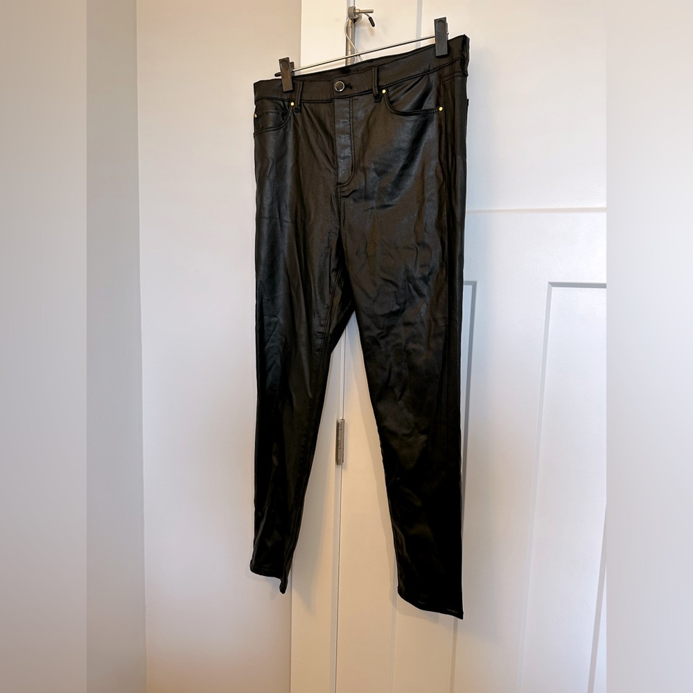 Ann Taylor Sculpting Pocket High Rise Skinny Jeans in Black Coated Denim size 10